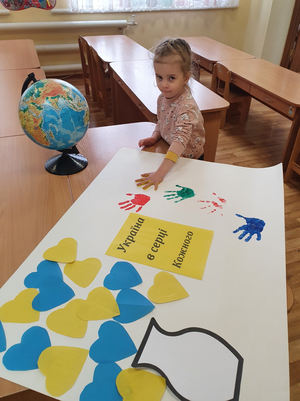 україна